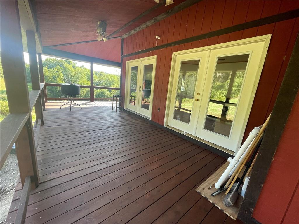 489 Jack Road Vandergrift, PA 15690 - Photo 7 of 47 a view of an empty room with wooden floor and a window