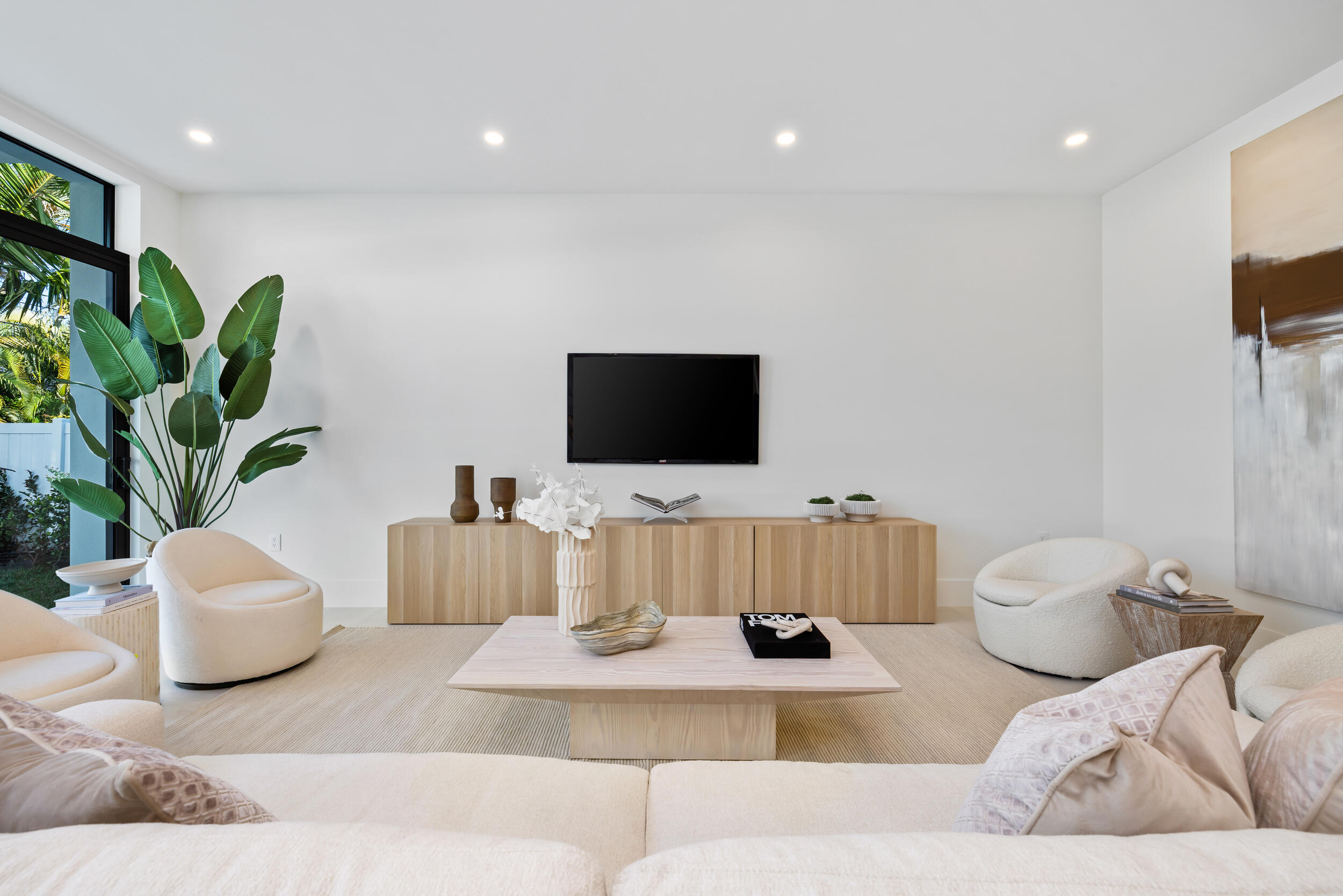 101 Northwest 17th Street Delray Beach, FL 33444 - Photo 12 of 46 a living room with furniture and a flat screen tv