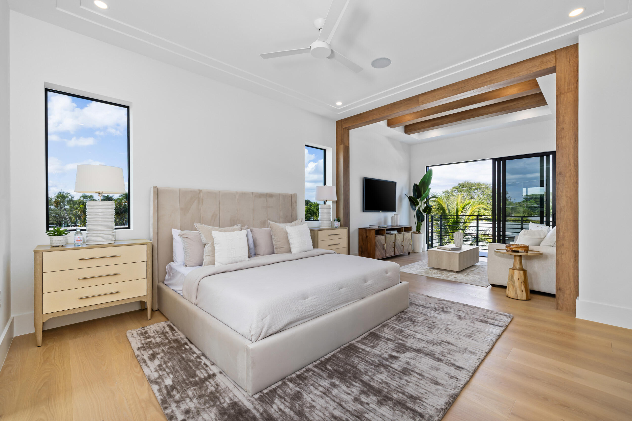 101 Northwest 17th Street Delray Beach, FL 33444 - Photo 18 of 46 a bedroom with a large bed and a large window