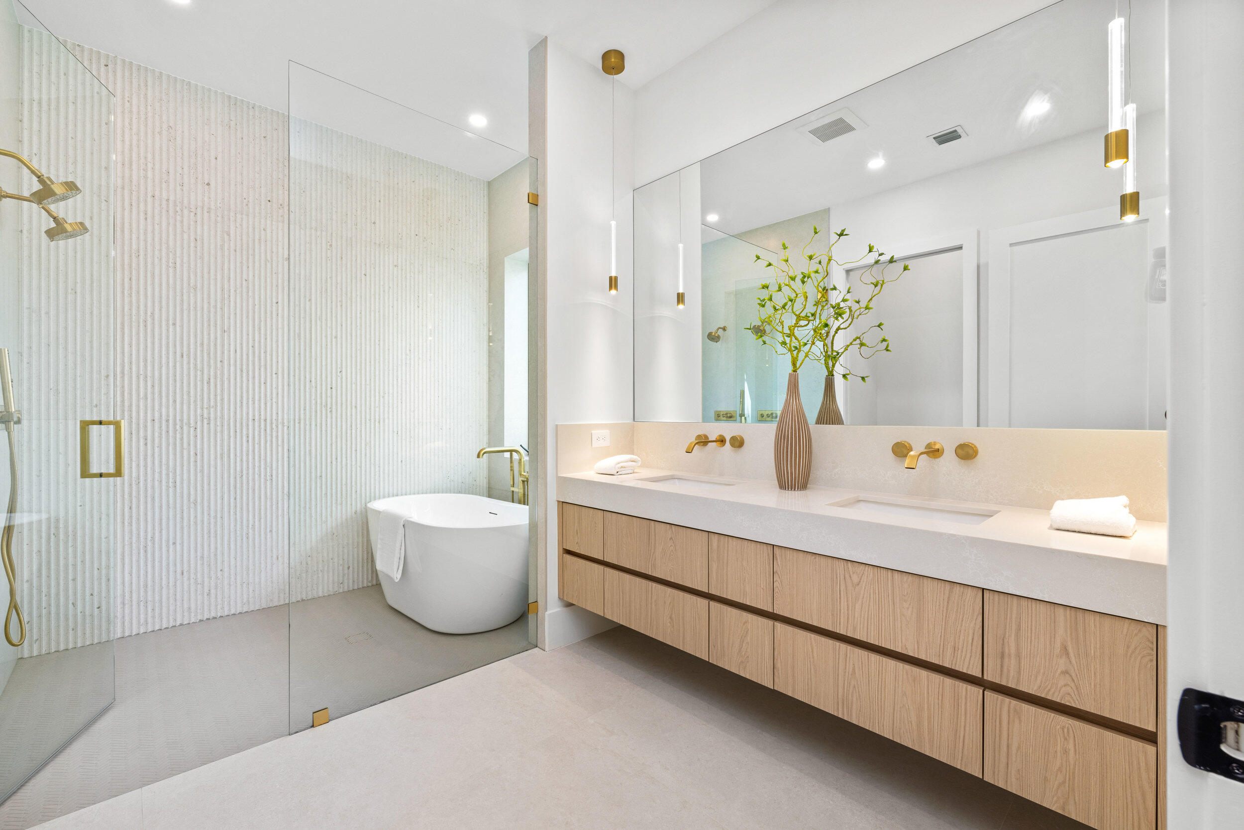 101 Northwest 17th Street Delray Beach, FL 33444 - Photo 25 of 46 a bathroom with a double vanity sink mirror and toilet