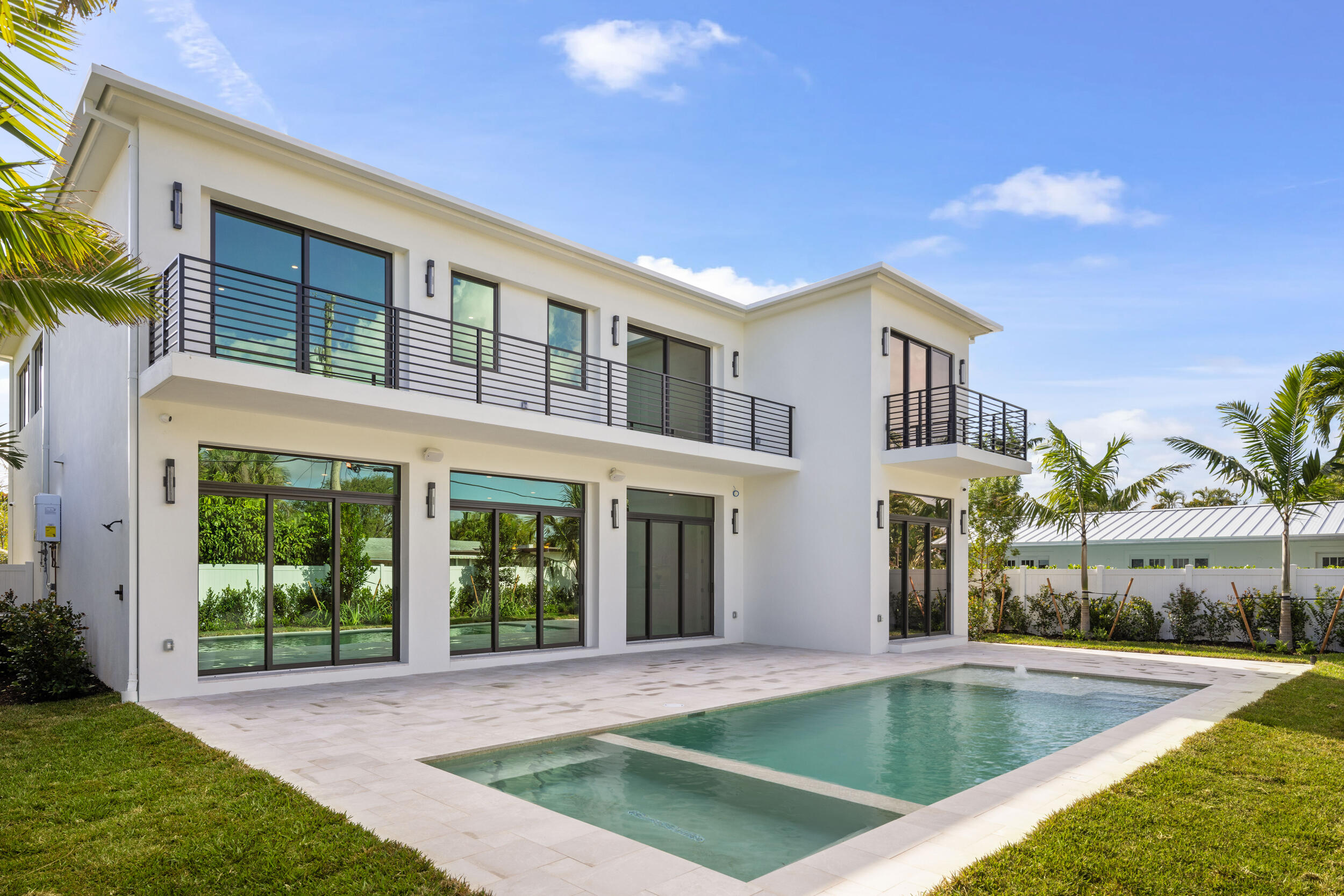 101 Northwest 17th Street Delray Beach, FL 33444 - Photo 3 of 46 a view of a house with swimming pool and sitting area