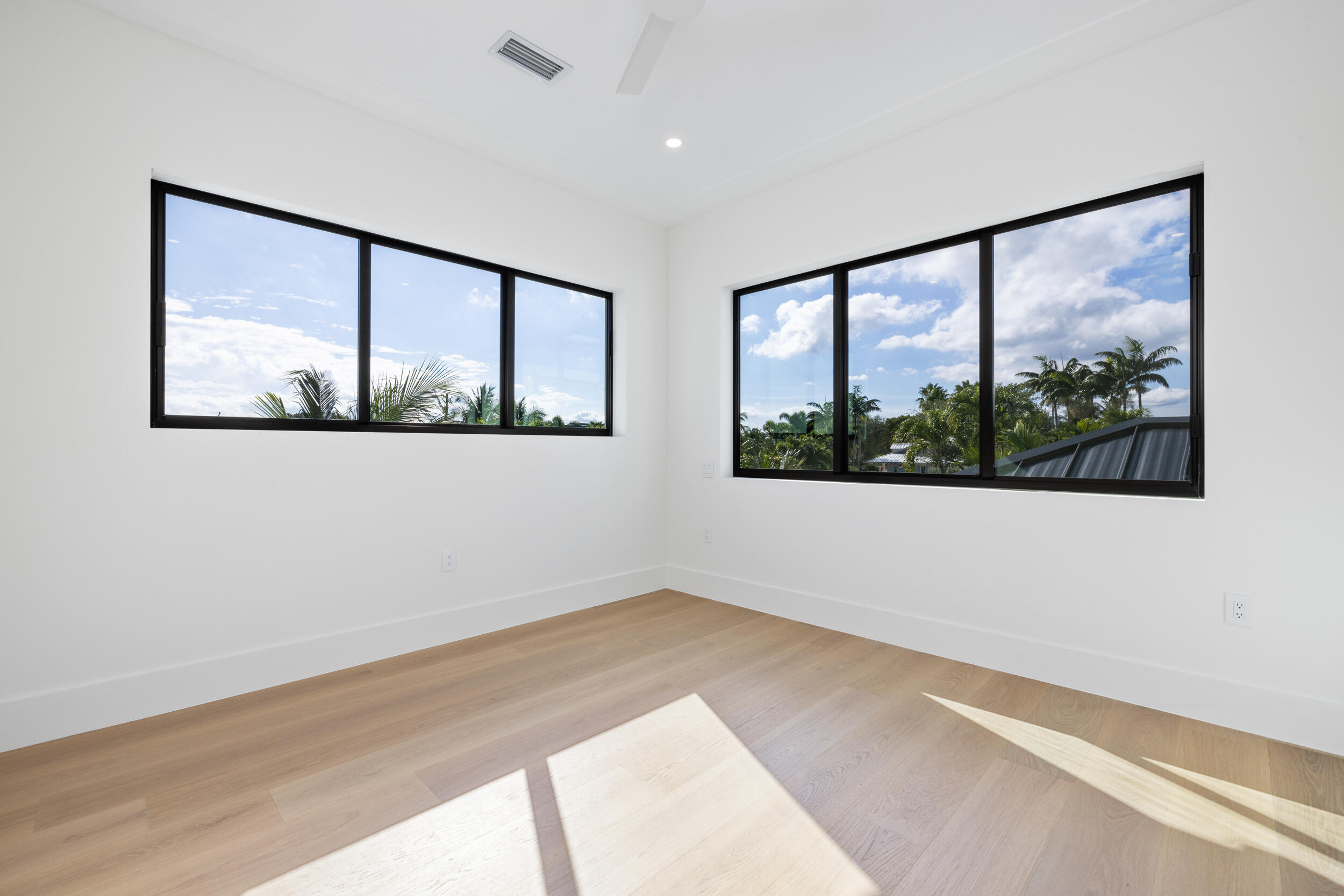 101 Northwest 17th Street Delray Beach, FL 33444 - Photo 32 of 46 an empty room with a large window