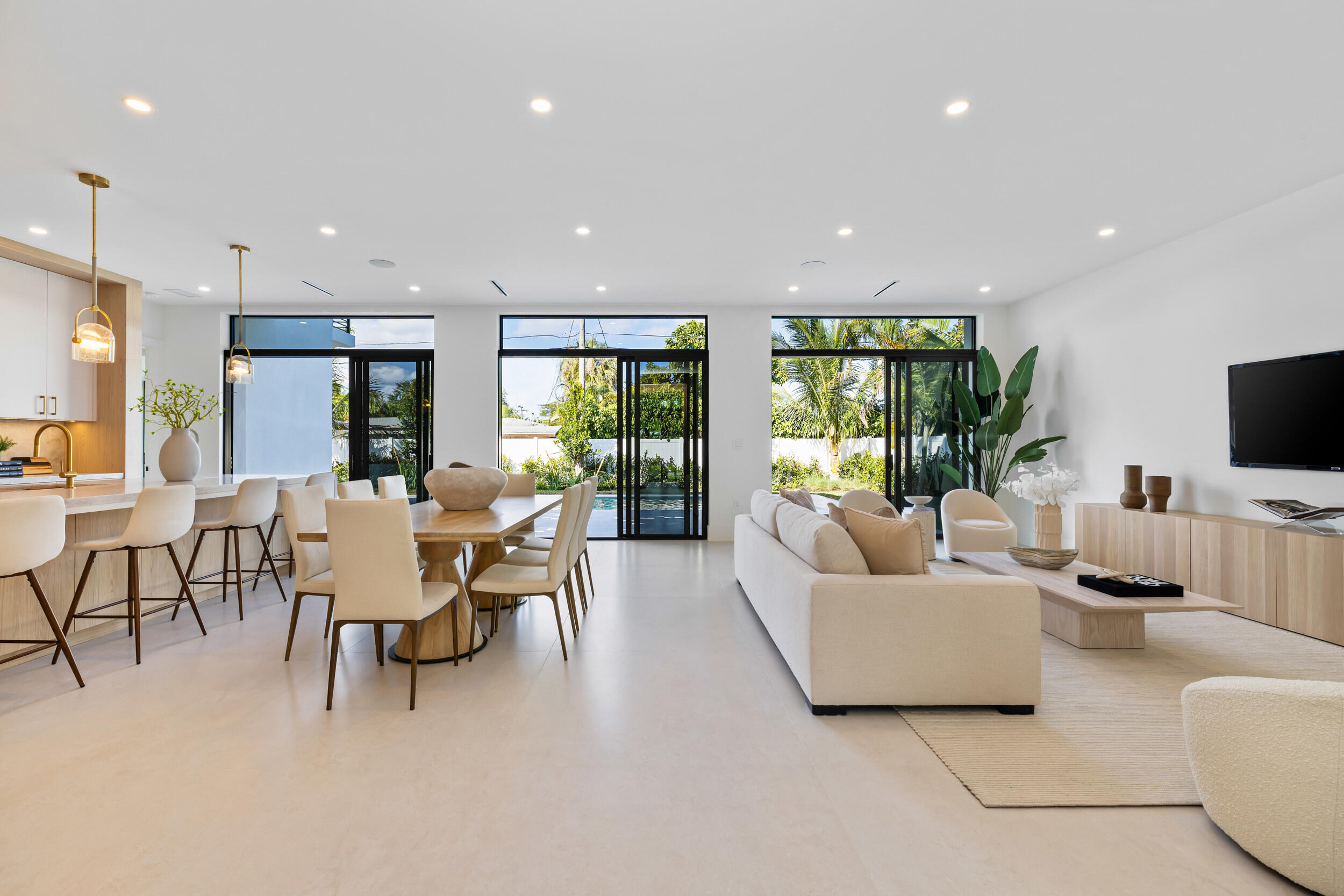 101 Northwest 17th Street Delray Beach, FL 33444 - Photo 6 of 46 a living room with furniture and a flat screen tv