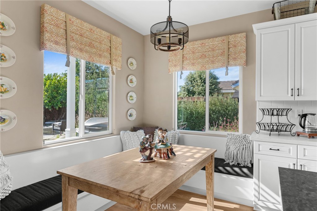 585 Valley Oak Road Solvang, CA 93463 - Photo 17 of 36 a view of a dining room with furniture window and outside view