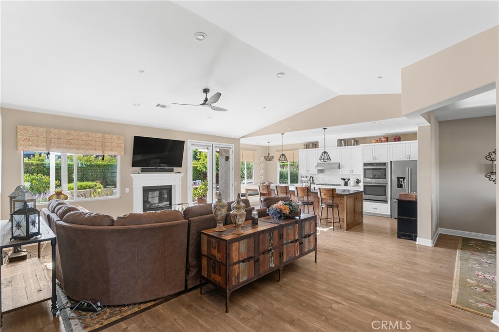 585 Valley Oak Road Solvang, CA 93463 - Photo 21 of 36 a living room with furniture flat screen tv and large windows