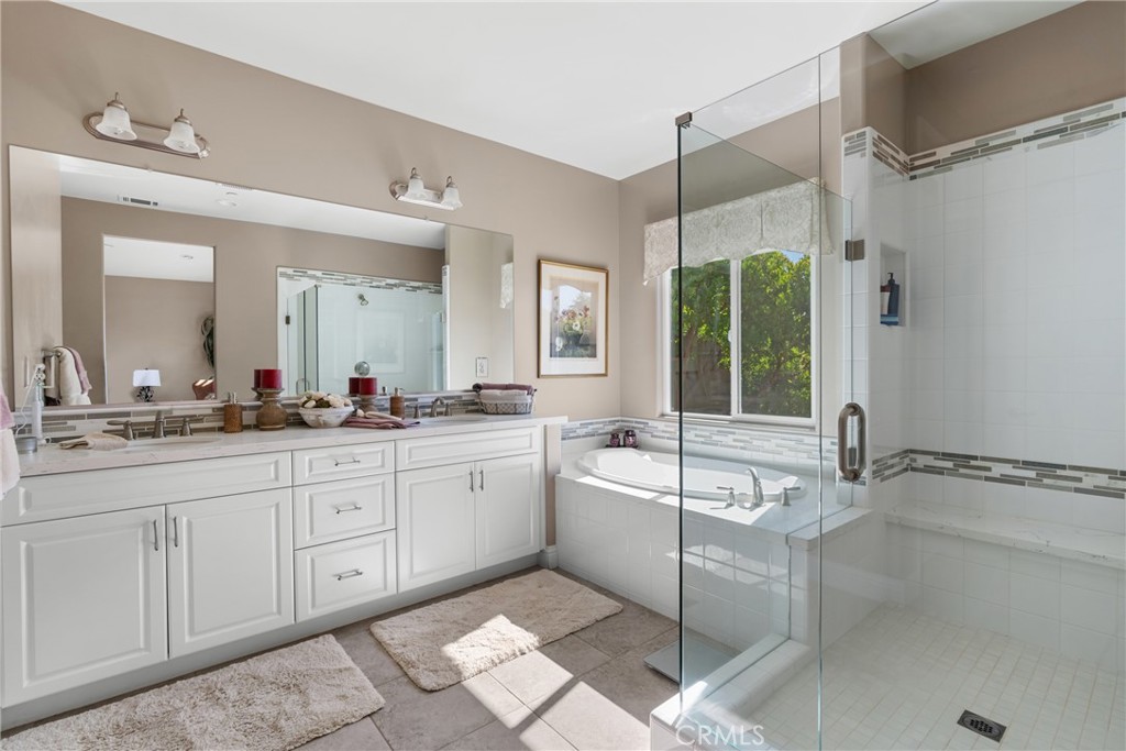 585 Valley Oak Road Solvang, CA 93463 - Photo 28 of 36 a spacious bathroom with a bathtub shower sink mirror and toilet