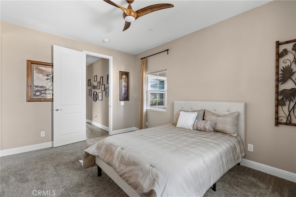 585 Valley Oak Road Solvang, CA 93463 - Photo 31 of 36 a bedroom with bed and window