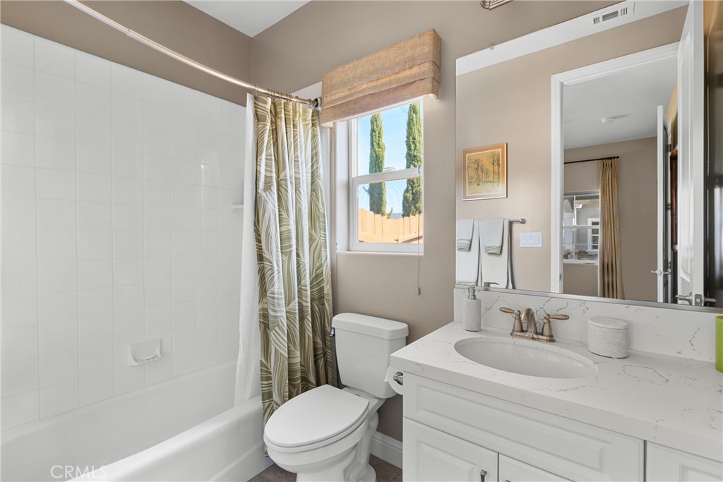 585 Valley Oak Road Solvang, CA 93463 - Photo 32 of 36 a bathroom with a sink toilet vanity and tub
