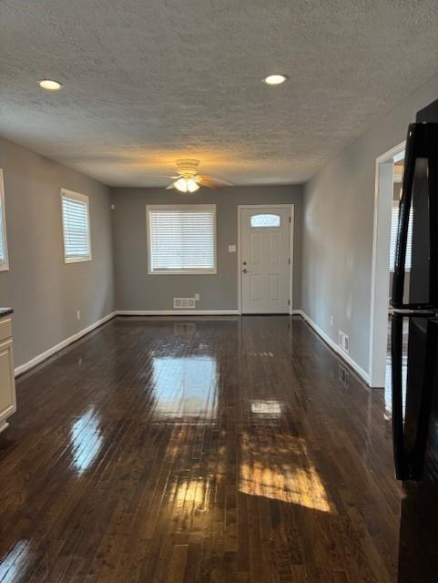 3741 Hopkins Road, Unit A Powder Springs, GA 30127 - Photo 12 of 25 a view of empty room with wooden floor and fan