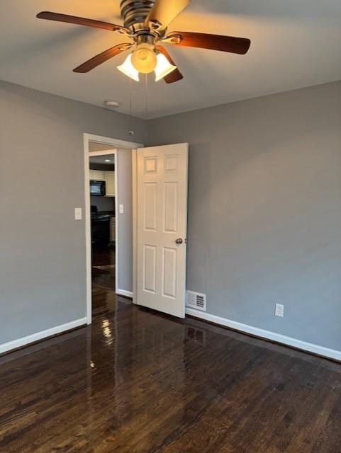 3741 Hopkins Road, Unit A Powder Springs, GA 30127 - Photo 15 of 25 an empty room with wooden floor closet and windows