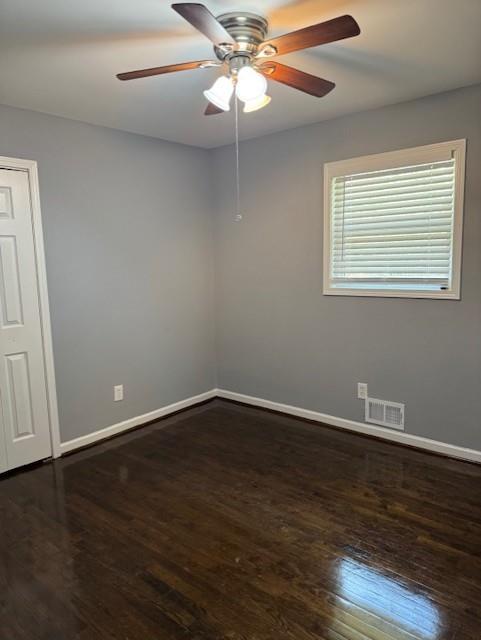3741 Hopkins Road, Unit A Powder Springs, GA 30127 - Photo 21 of 25 a view of an empty room with wooden floor and a window