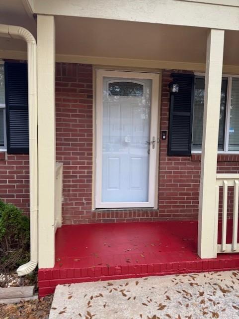 3741 Hopkins Road, Unit A Powder Springs, GA 30127 - Photo 4 of 25 a view of a red door of the house