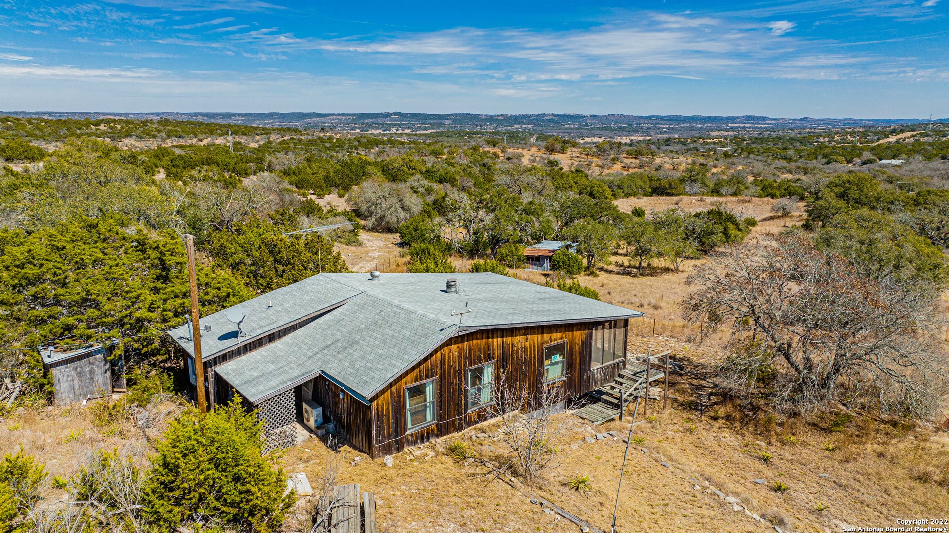 a view of a balcony with an ocean view