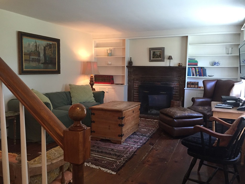 6 Chebacco Road Ipswich, MA 01938 - Photo 7 of 11 a living room with furniture and a fireplace