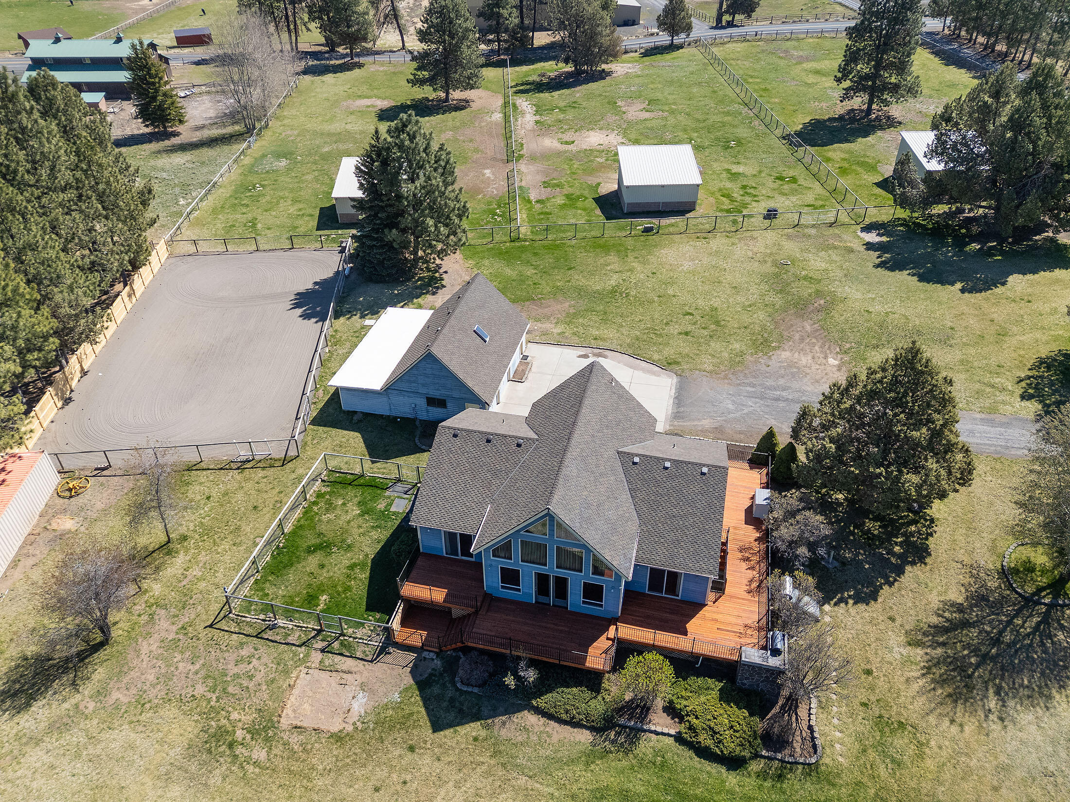 60359 Horse Butte Road Bend, OR 97702 - Photo 7 of 28 Ariel view home deck & stalss (before ne