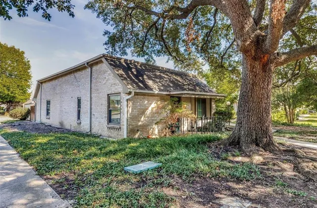 a front view of house with garden