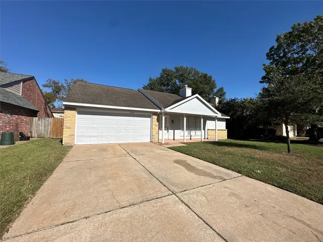 a front view of a house with yard