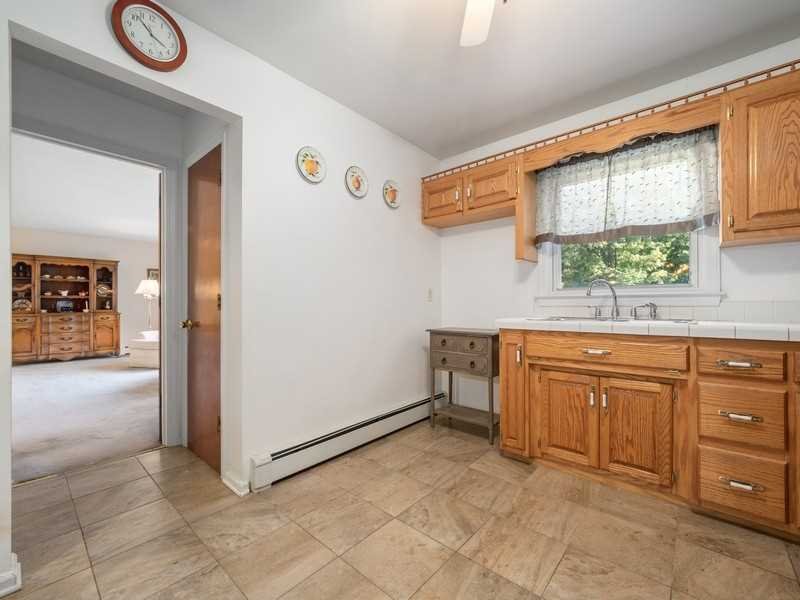 22 Brown Road East Fishkill, NY 12590 - Photo 14 of 37 a room with a sink and a large mirror