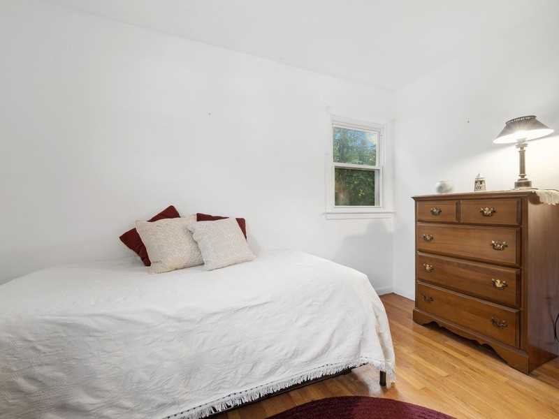 22 Brown Road East Fishkill, NY 12590 - Photo 27 of 37 a bedroom with a bed and a night stand