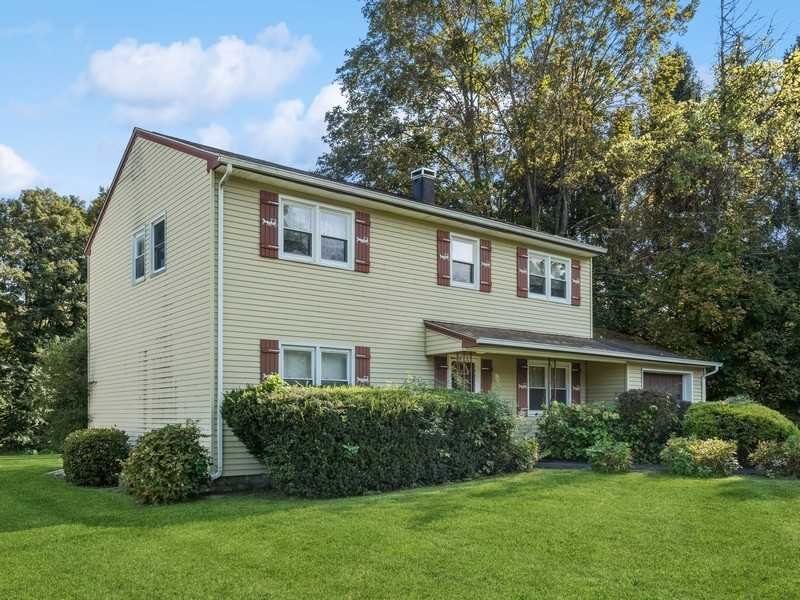 22 Brown Road East Fishkill, NY 12590 - Photo 34 of 37 a front view of a house with a garden