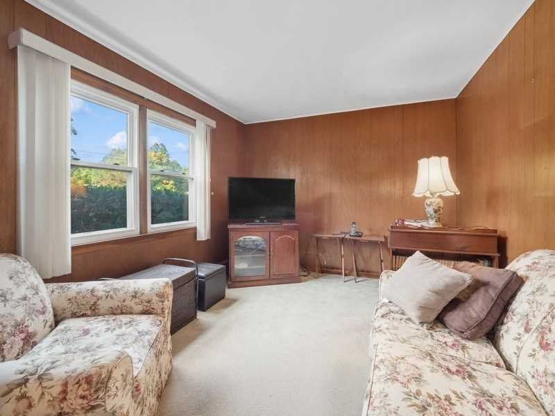 22 Brown Road East Fishkill, NY 12590 - Photo 8 of 37 a bedroom with furniture and a large window