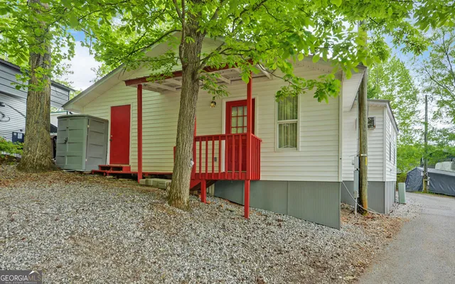 a house with trees in front of it