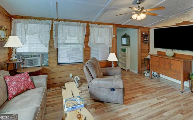 a bedroom with a bed and a table in it