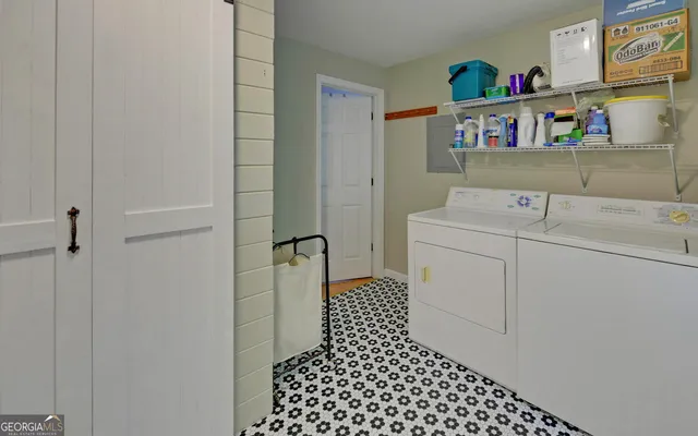 a view of a garden with an outdoor seating