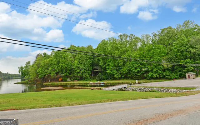 a aerial view of a house with a yard