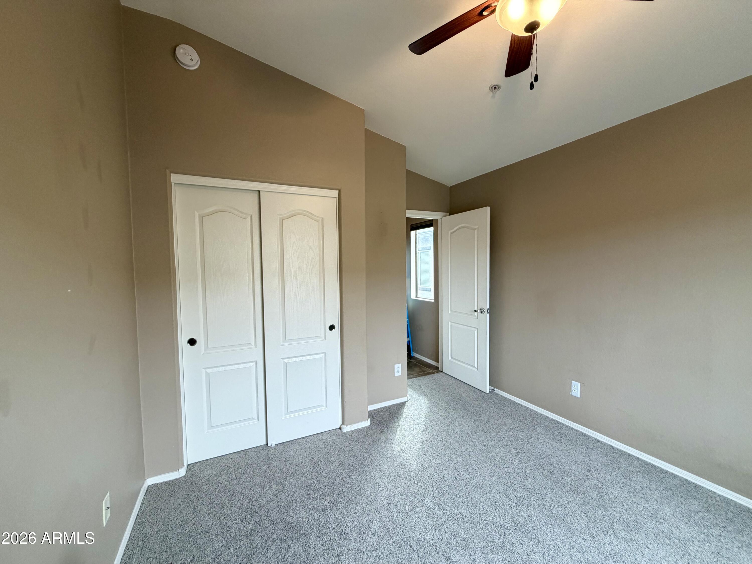 2725 East Mine Creek Road, Unit 2058 Phoenix, AZ 85024 - Photo 12 of 16 a view of an empty room