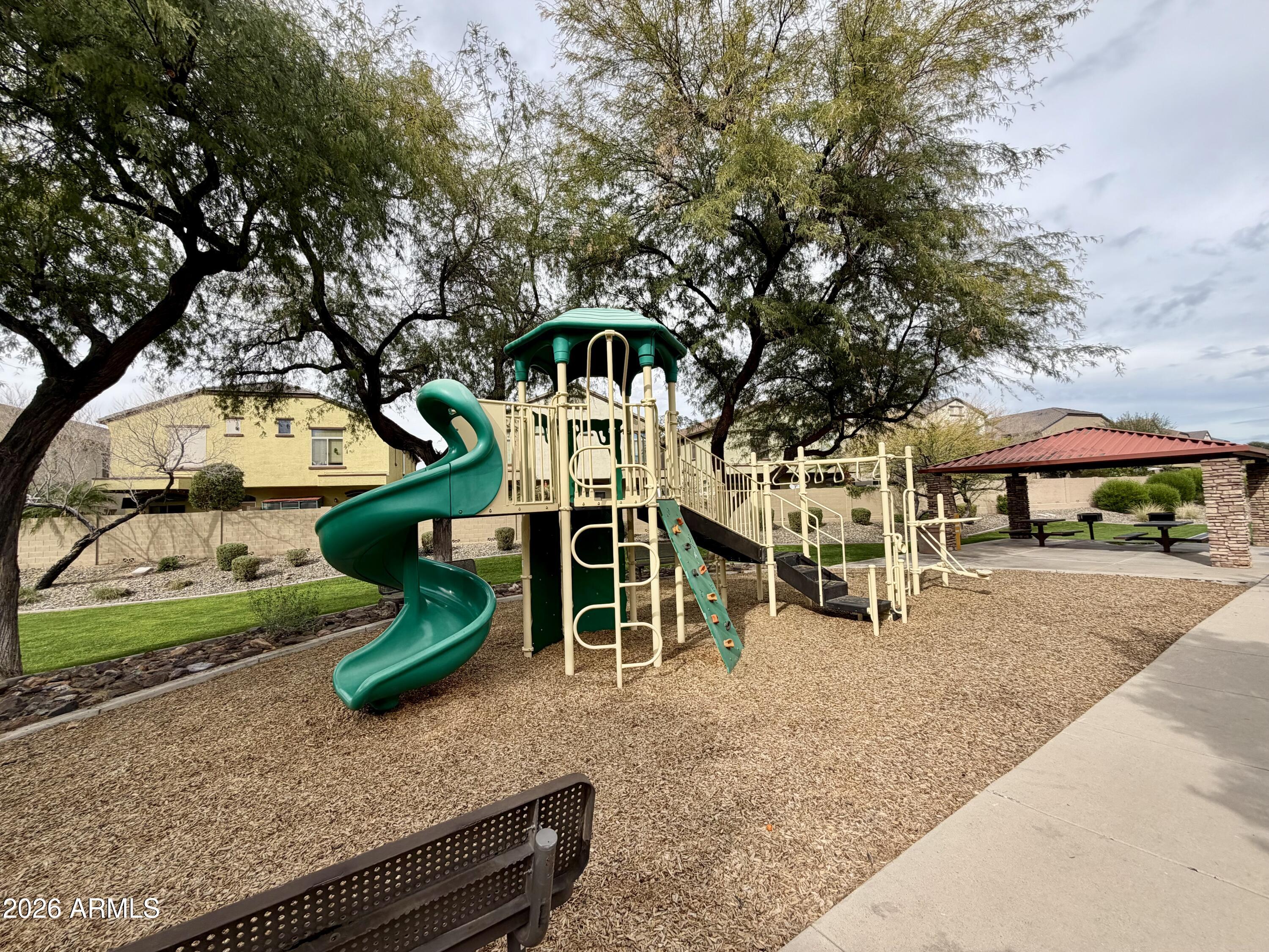 2725 East Mine Creek Road, Unit 2058 Phoenix, AZ 85024 - Photo 16 of 16 an outdoor space with lots of white furniture