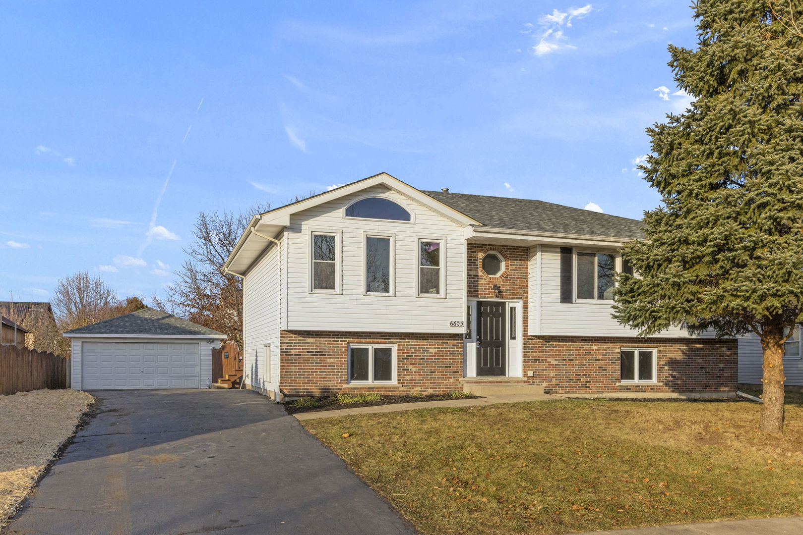 front view of a house with a street