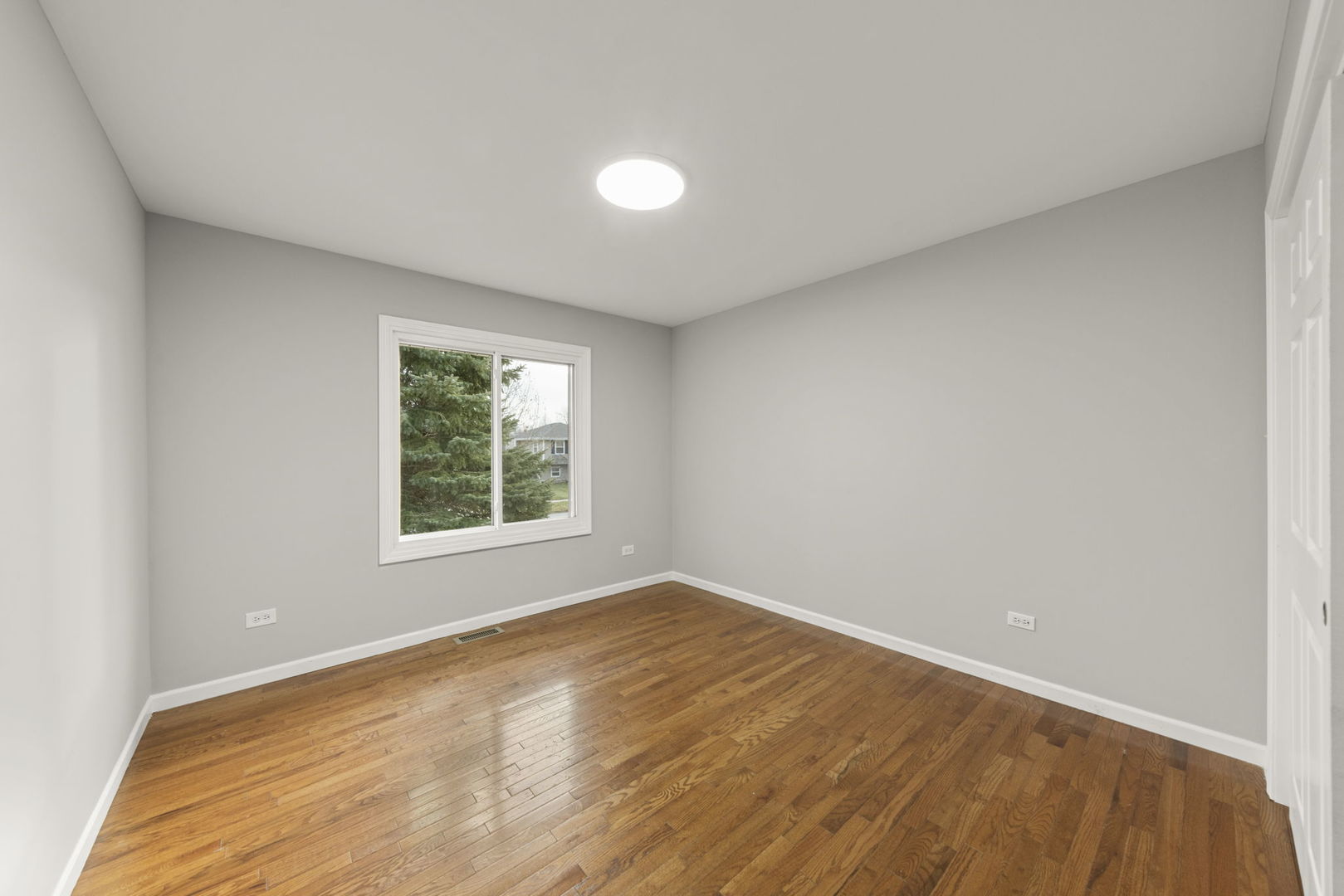 6605 Klinger Lane Plainfield, IL 60586 - Photo 14 of 21 a view of an empty room with a window