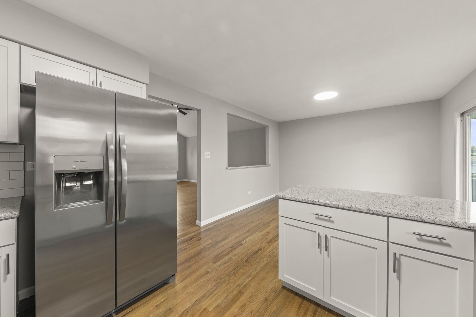 6605 Klinger Lane Plainfield, IL 60586 - Photo 6 of 21 a kitchen with cabinets and stainless steel appliances