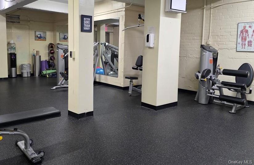 84-01 Main Street, Unit 207 Queens, NY 11435 - Photo 3 of 4 a view of a room with gym equipment