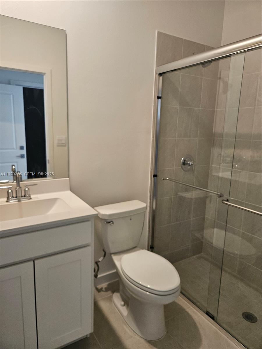 157 Northeast 13th Street Homestead, FL 33030 - Photo 10 of 10 a bathroom with a sink toilet and shower