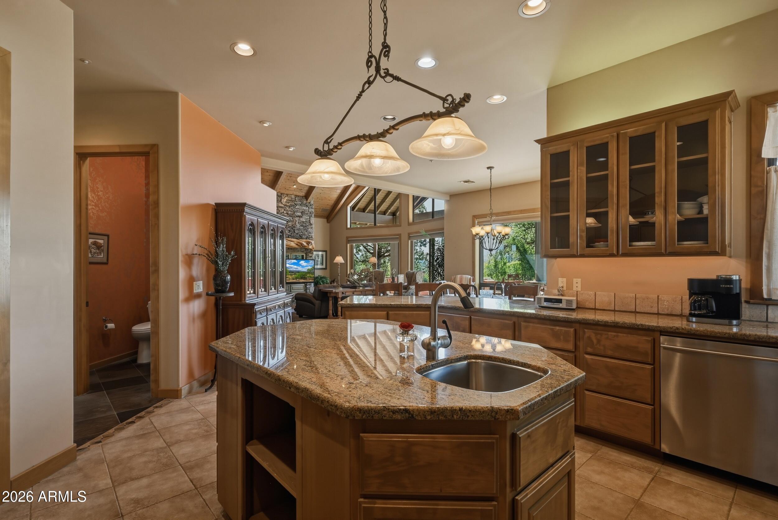 3101 East Mayfield Payson, AZ 85541 - Photo 17 of 71 a kitchen with a sink a counter space appliances and cabinets