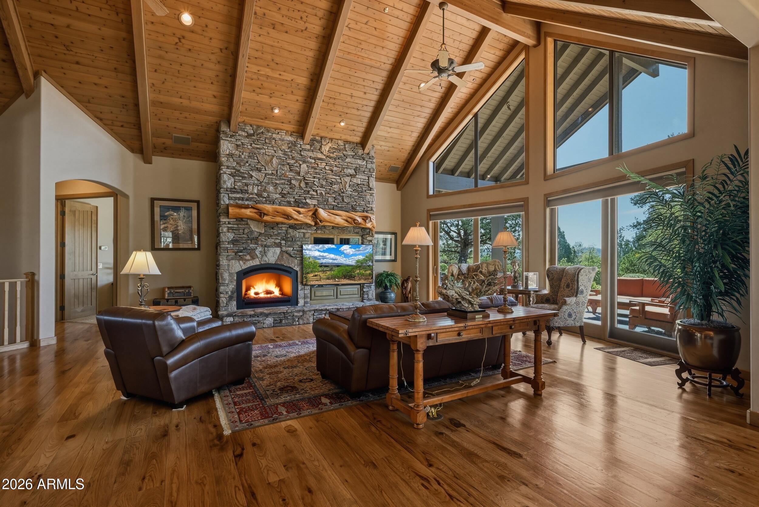 3101 East Mayfield Payson, AZ 85541 - Photo 19 of 71 a living room with fireplace furniture and a fireplace