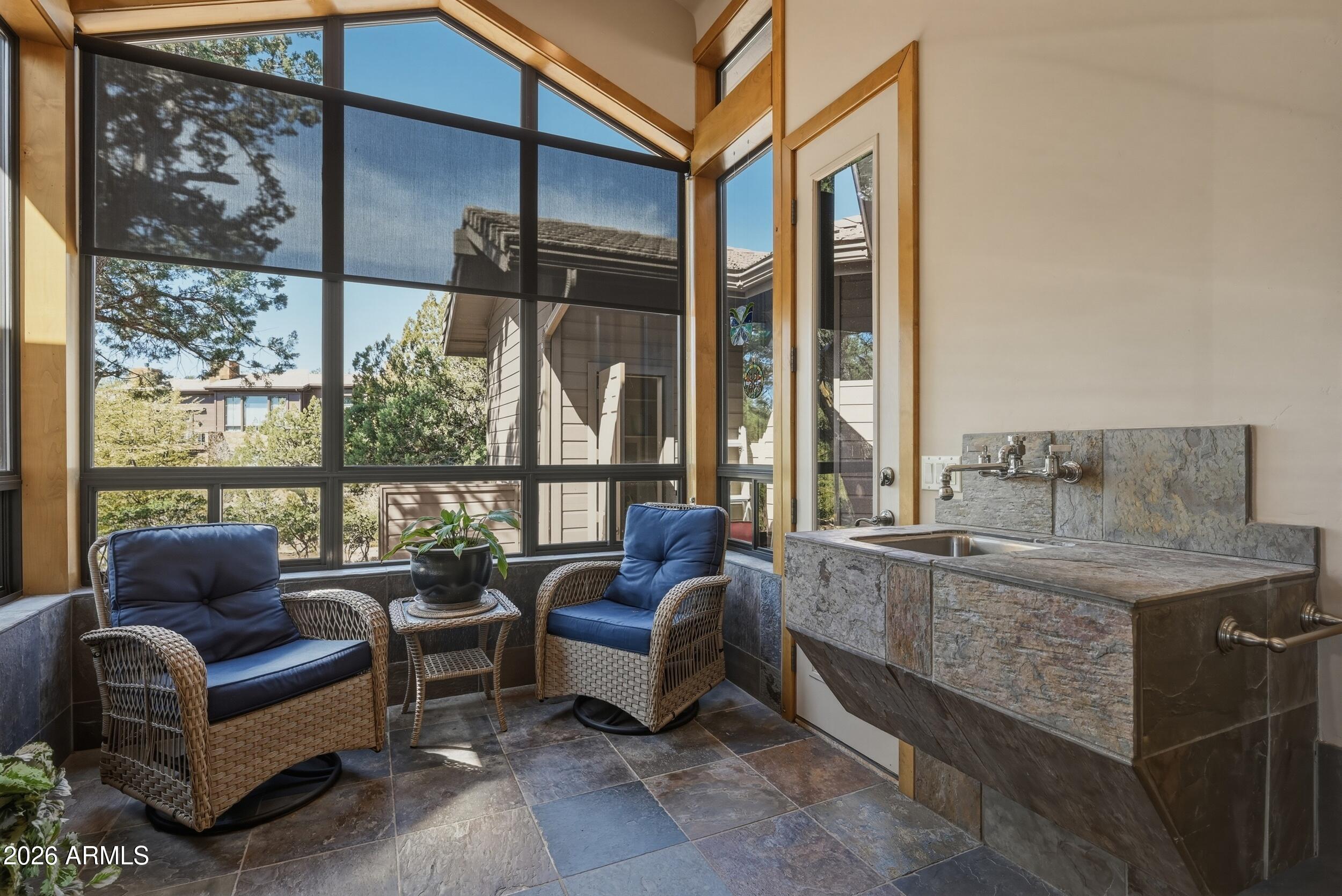 3101 East Mayfield Payson, AZ 85541 - Photo 40 of 71 a living room with furniture and a floor to ceiling window