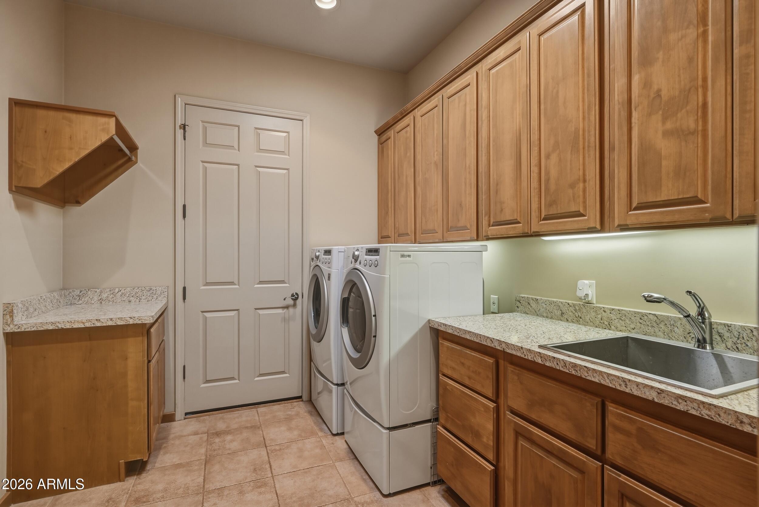 3101 East Mayfield Payson, AZ 85541 - Photo 41 of 71 a utility room with sink dryer and washer