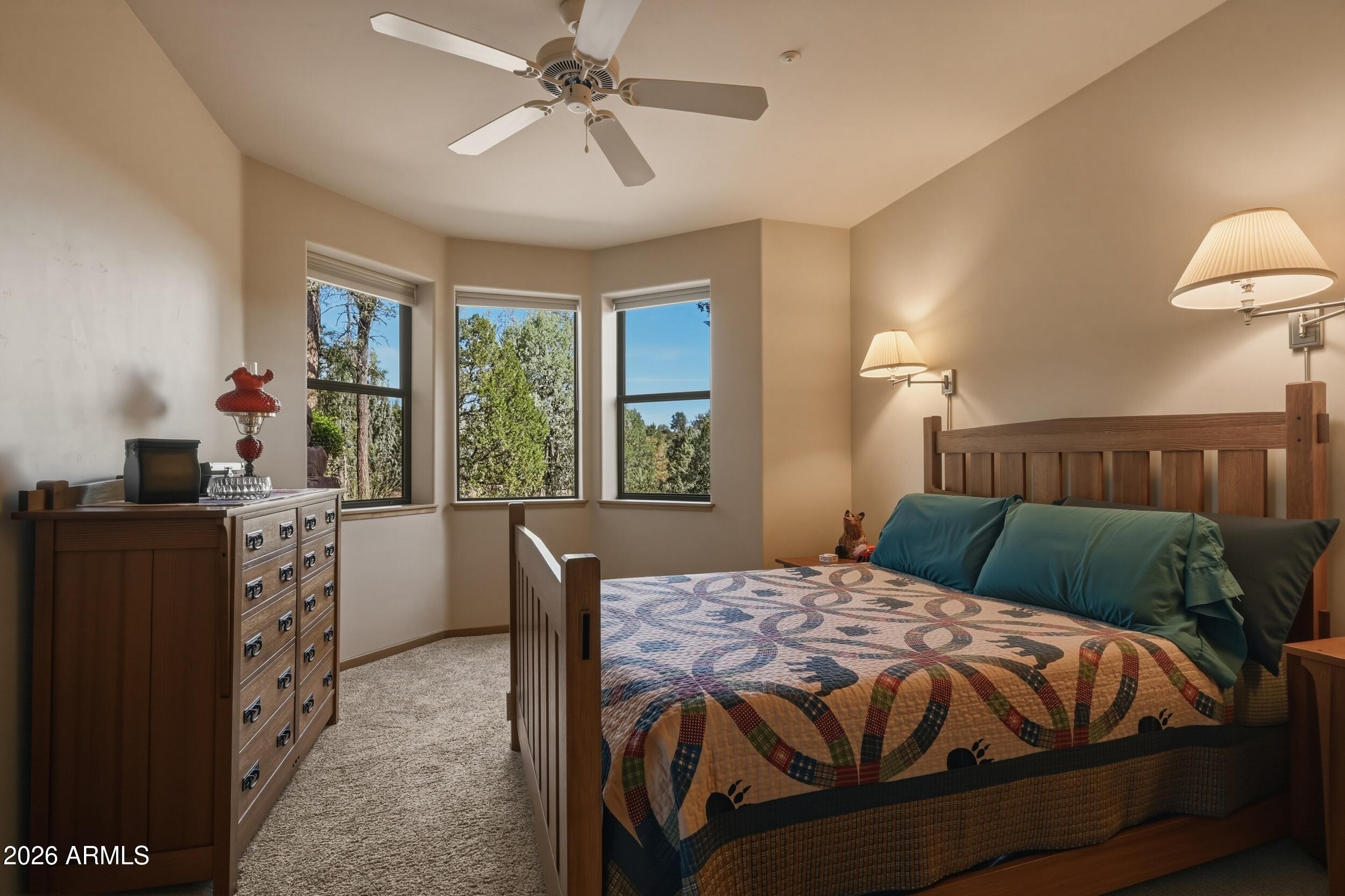 3101 East Mayfield Payson, AZ 85541 - Photo 52 of 71 a bedroom with a large bed and a window