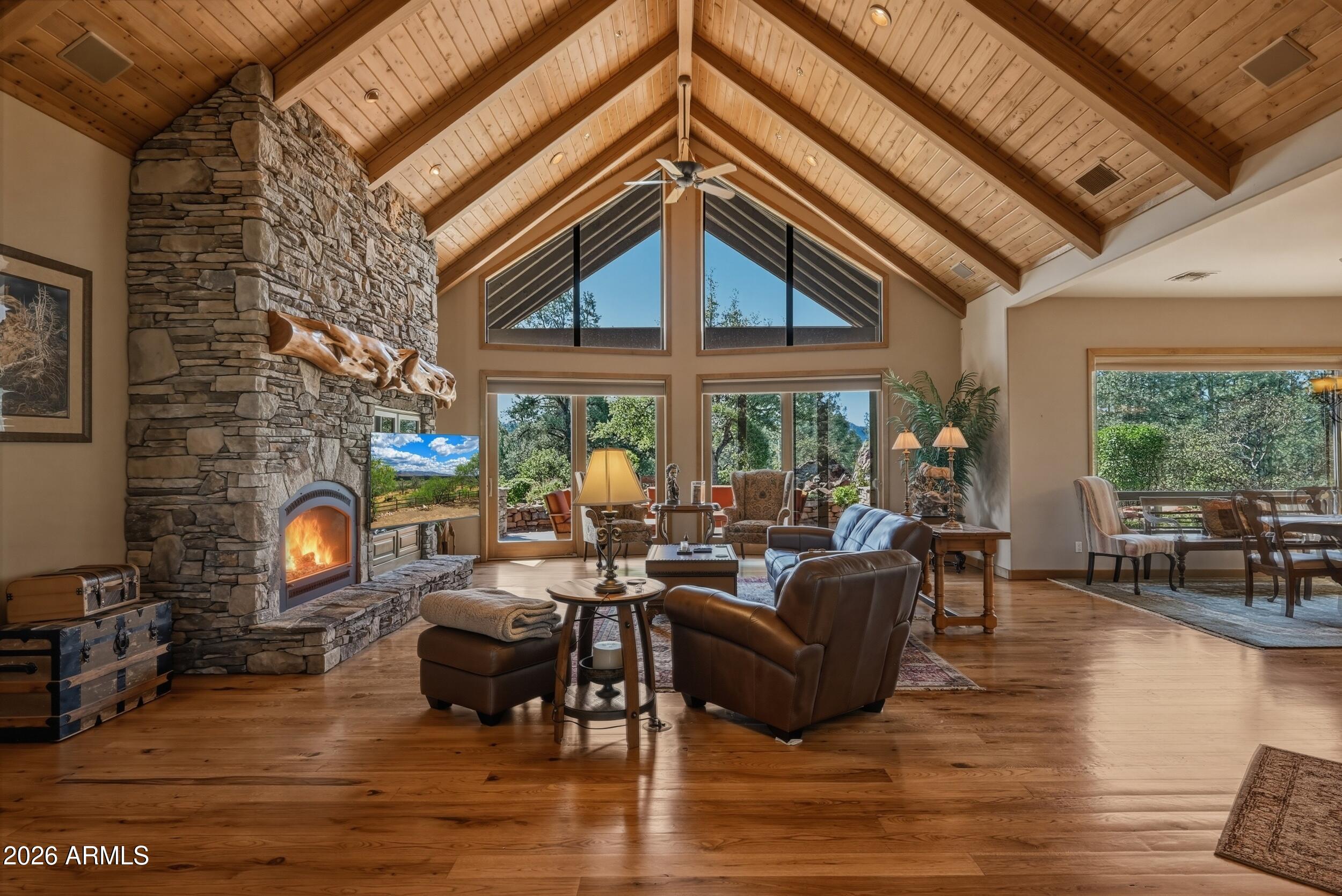 3101 East Mayfield Payson, AZ 85541 - Photo 6 of 71 a living room with fireplace furniture and a large window