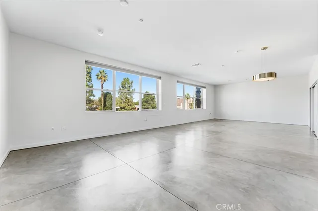 a view of a room with shelf on the wall