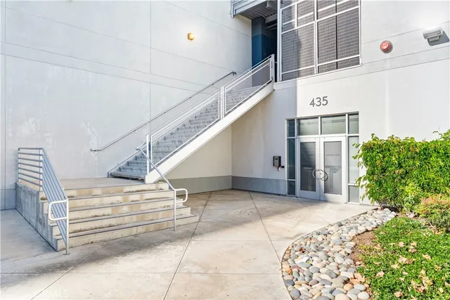 a view of a building along the street