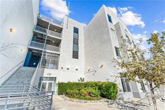 a view of a building with a garden