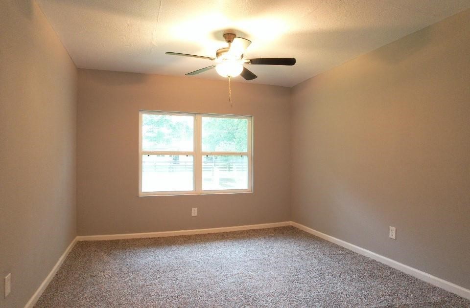 25373 Goodson Road Splendora, TX 77372 - Photo 25 of 41 an empty room with a window