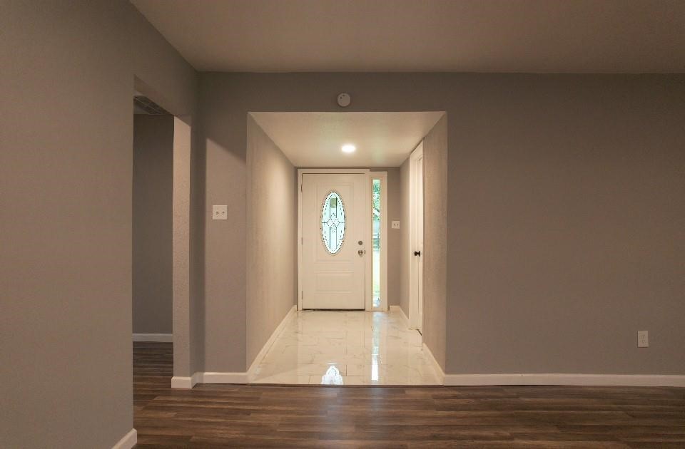 25373 Goodson Road Splendora, TX 77372 - Photo 37 of 41 a view of room with window and hardwood floor