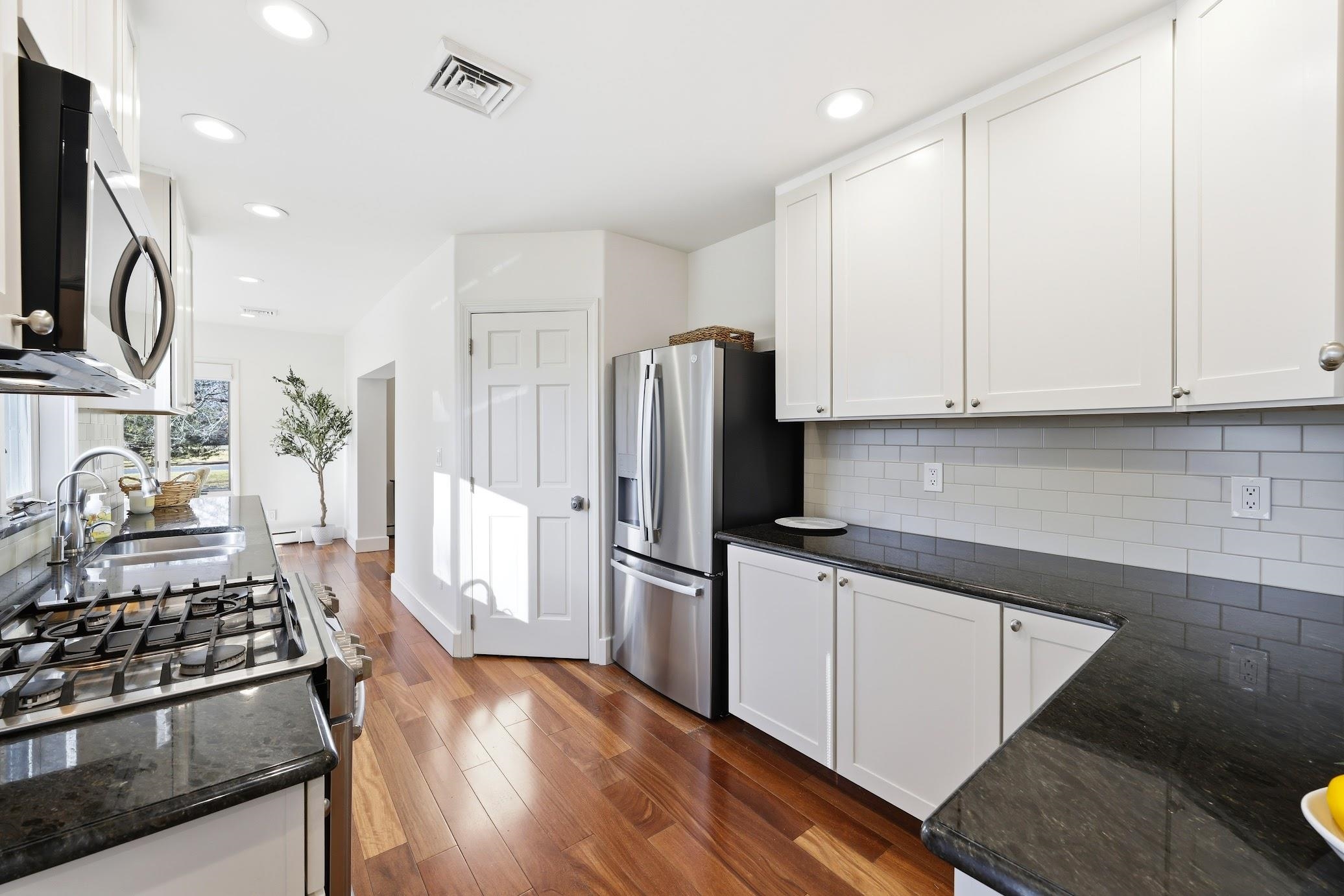 862 Central Hammonton, NJ 08037 - Photo 23 of 46 a kitchen with stainless steel appliances granite countertop a refrigerator stove and sink