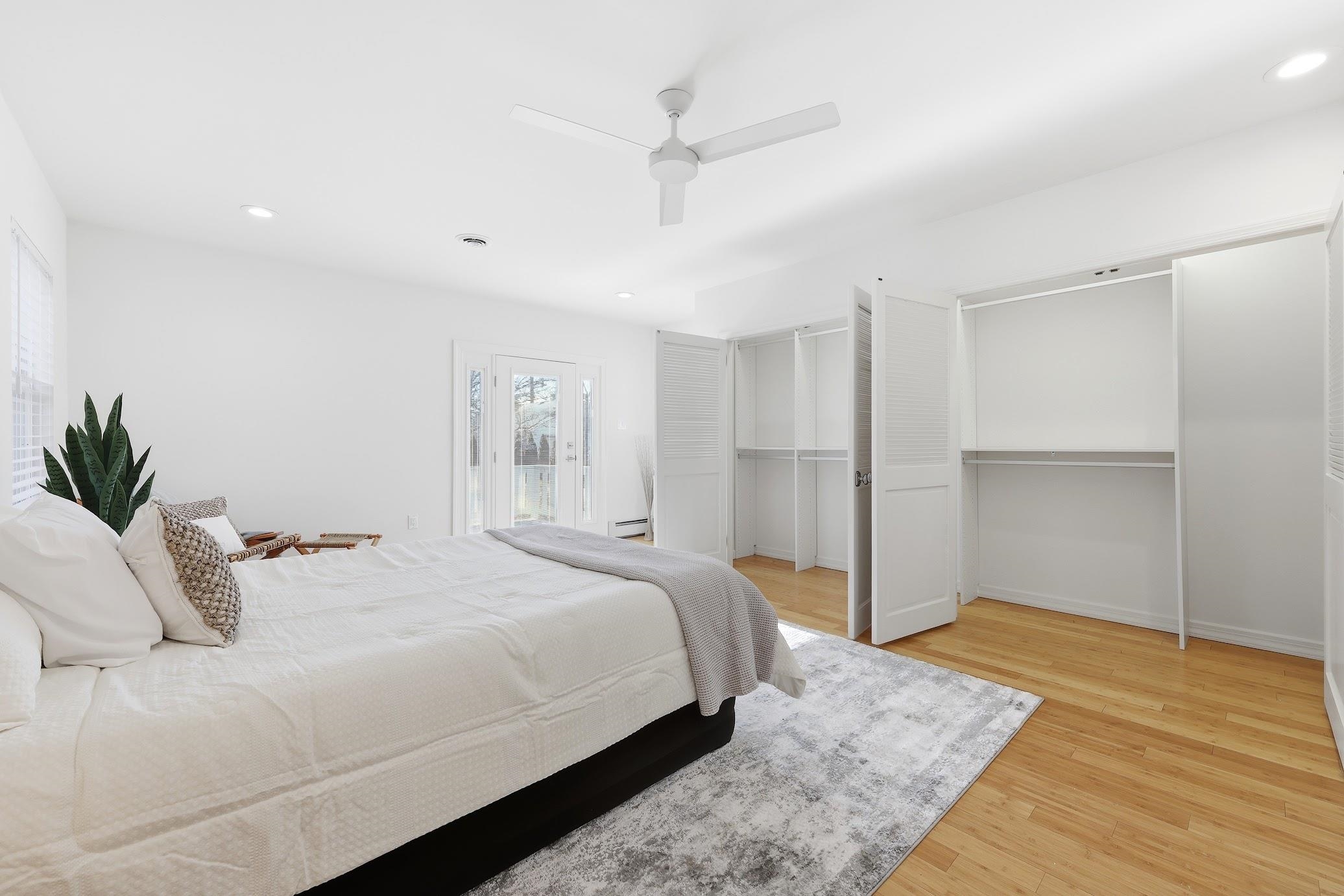 862 Central Hammonton, NJ 08037 - Photo 26 of 46 a bedroom with a large bed and ceiling fan