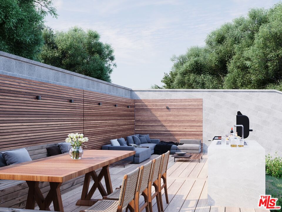 448 Beech Street Los Angeles, CA 90065 - Photo 19 of 31 a backyard of a house with table and chairs